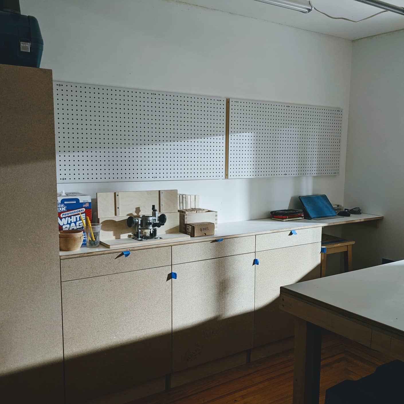 October 26th, 2020: Tonight we hung up a couple of pegboards to help organize our tools. Slowly but surely, our studio is coming together!